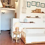 Cosy Holiday Home In Marinella With Shared Pool