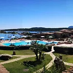 Inviting Holiday Home In Marinella With Shared Garden