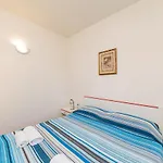 Apartment In San Teodoro 44946
