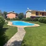 Porto Pino, Garden And Pool