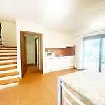 Pgs Immobiliare Srls Guardioli Bouganville Villetta A Schiera Con Terrazza Attrezzata E Posto Auto Privato La Maddalena