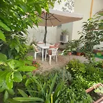 Flowered House With Garden