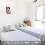 Homey Experience - Country Inn Apartments Garden & Seaview