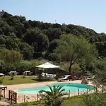 Ferienhaus In Badesi Mit Moeblierter Terrasse Und Meerblick