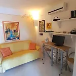 Apartment In Marinella With Garden